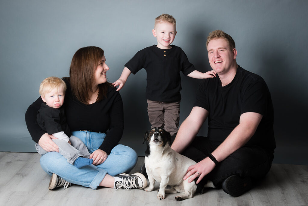 Family returning to Stables Photography Studios for updated portraits in South Wales